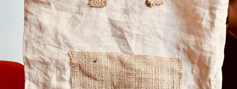 Una borsa in juta con un vaso e una nostra pianta